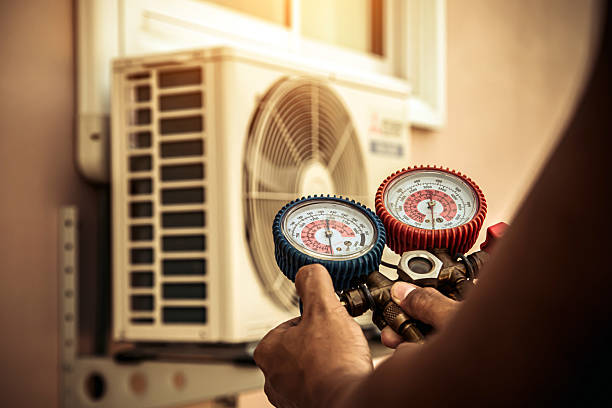 Professional Ac Installation technician working in Olympia Fields, IL